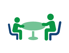 young child and adult icon sitting at desk