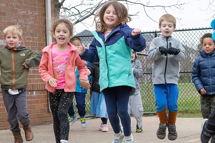 kids jumping together
